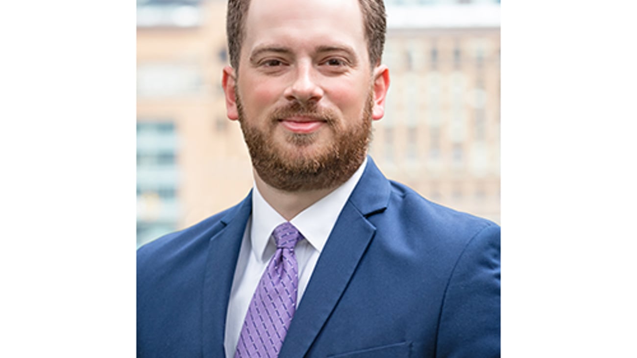 a man wearing a suit and tie