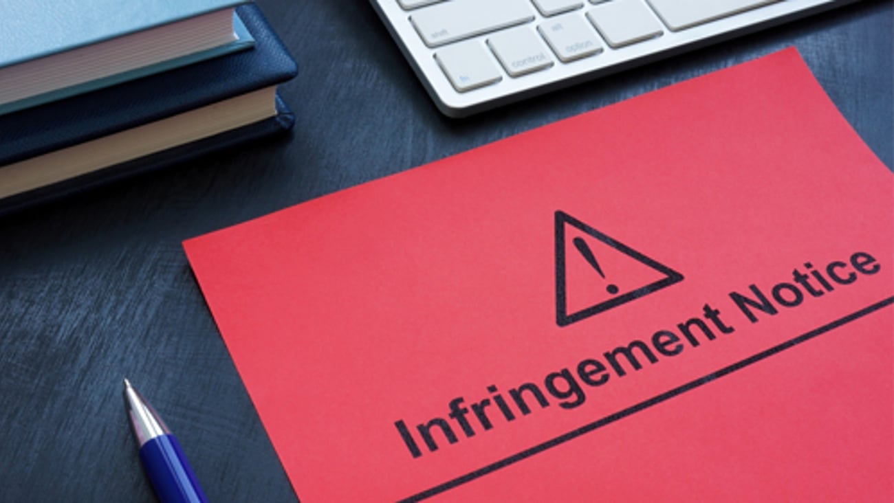 folder that says infringement notice