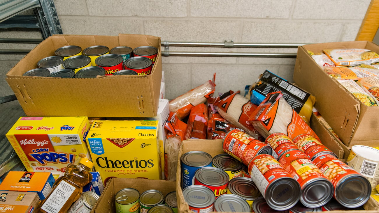 TORONTO, ONTARIO, CANADA - PEOPLE WORK AT JEWISH FOOD BANK, PREPARING FOOD FOR FAMILIES IN NEED OF HELP DURING COVID-19 PANDEMIC. ; Shutterstock ID 1863342994