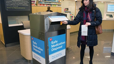 a man and a woman standing in front of a store