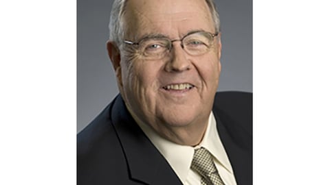 a man wearing a suit and tie