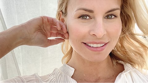 Niki Taylor smiling for the camera