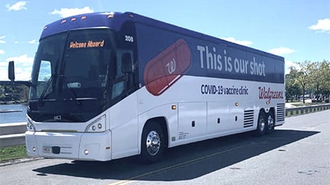 a bus parked on the side of a road