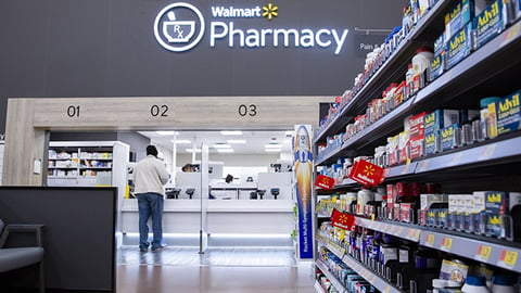 a person standing in front of a store