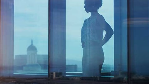 a person standing in front of a window