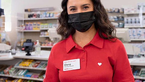 a person standing in front of a store