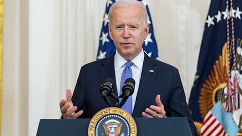 Joe Biden wearing a suit and tie