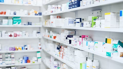 a close up of a pharmacy shelf