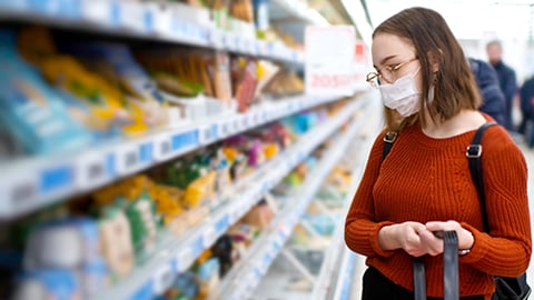 Pharmacy customer at shelves