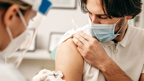 Healthcare worker giving vaccine