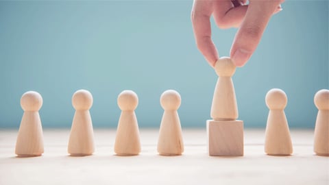 wooden blocks shaped as people