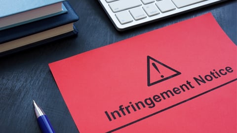 folder that says infringement notice