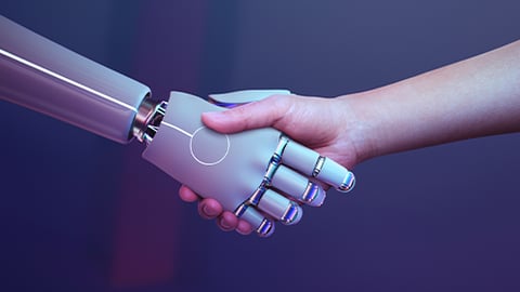 robot and human hand handshake