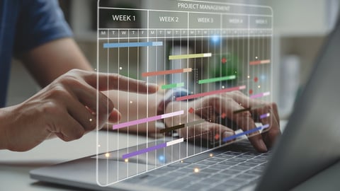 Project manager working with Gantt chart schedule to update the schedule, Management diagram with planning software on laptop screen.; Shutterstock ID 2299357535