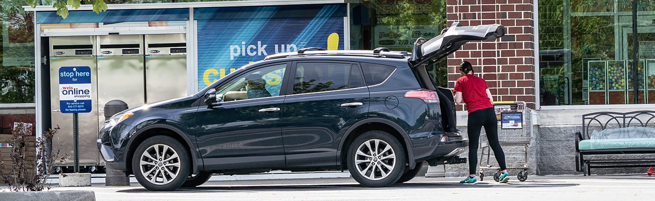 a person riding on the back of a car