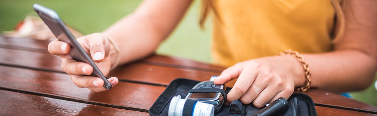 a close up of a person using a cell phone