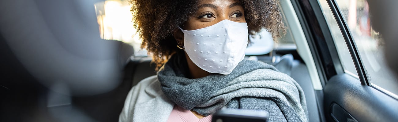 a close up of a person in a car