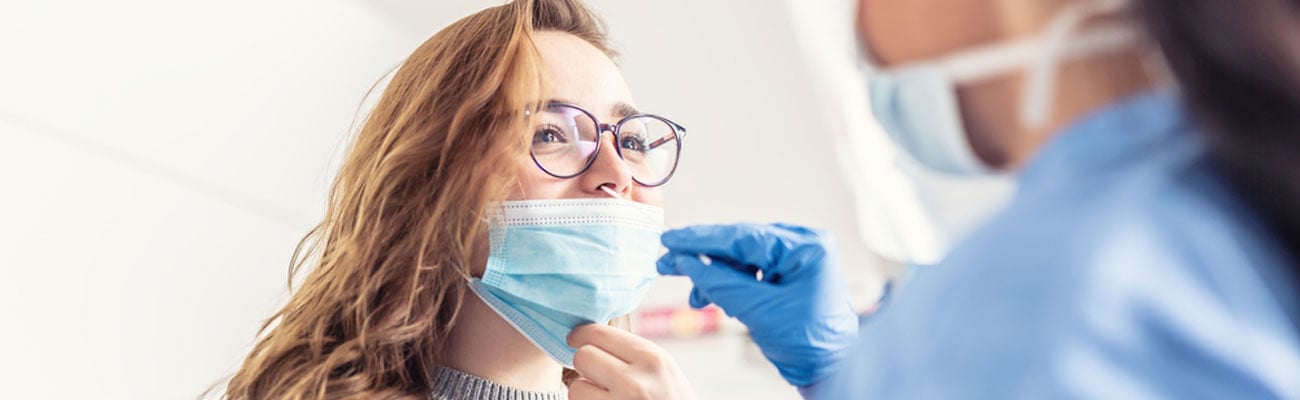 woman getting flu test