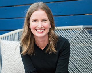 a woman smiling for the camera