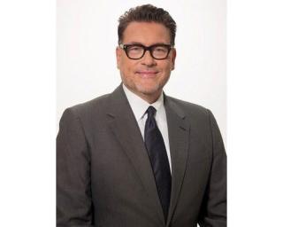 a man wearing a suit and tie