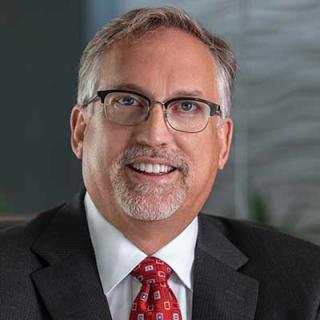 a man wearing a suit and tie