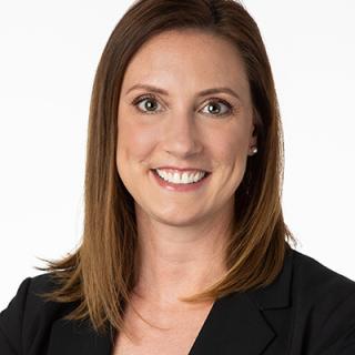 a woman smiling for the camera
