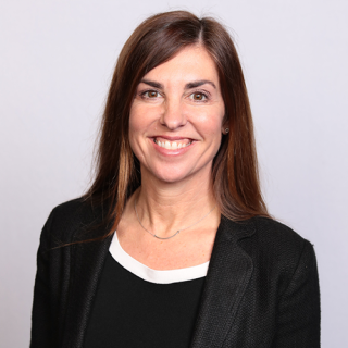 a woman smiling for the camera