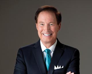 a man wearing a suit and tie
