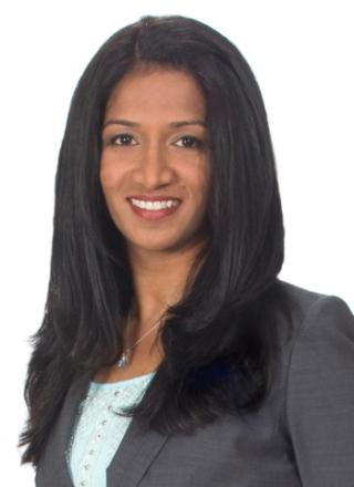 a woman smiling for the camera