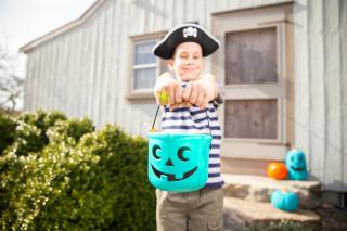 CVS-pharmacy-FARE-partnership-boy-holding-jackolantern