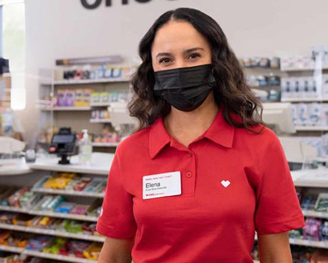 a person standing in front of a store