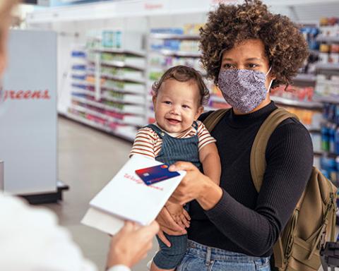 a person holding a baby