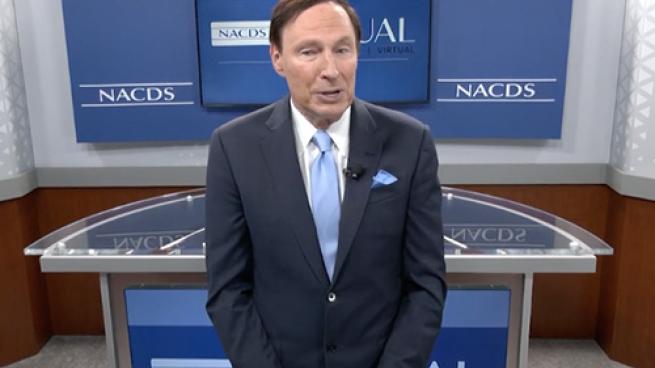 a man in a suit and tie