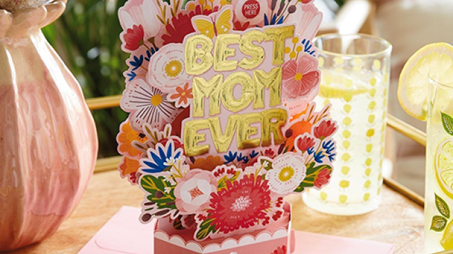 a vase filled with flowers sitting on a table