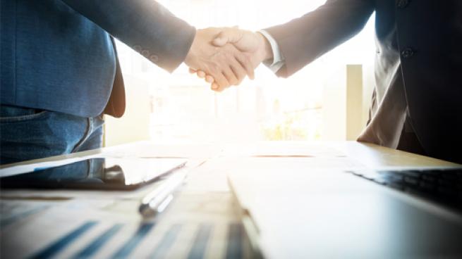 Two men shaking hands
